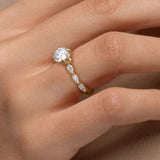 Elegant Round Diamond Engagement Ring with Marquise Side Stones