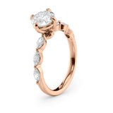 Elegant Round Diamond Engagement Ring with Marquise Side Stones