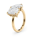 Modern Toi et Moi Engagement Ring with Emerald & Pear Cut Diamonds