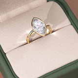 Marquise Cut Twisted Shank Bezel Set Ring