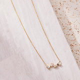 Bezel Set Emerald Cut Diamond Necklace