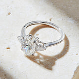 Oval Shape Lab Grown Diamond Engagement Ring with Side Pear Shape Stones